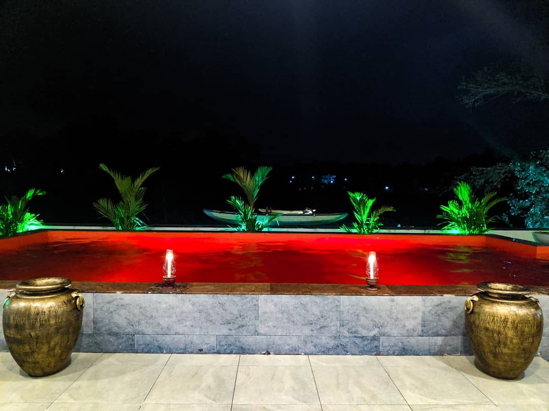 Red pool illuminated at night